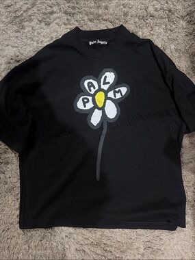 Palm Angels Black Tee with White Daisy and Yellow Center